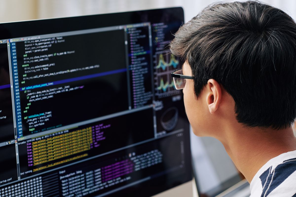 A picture of someone coding. 