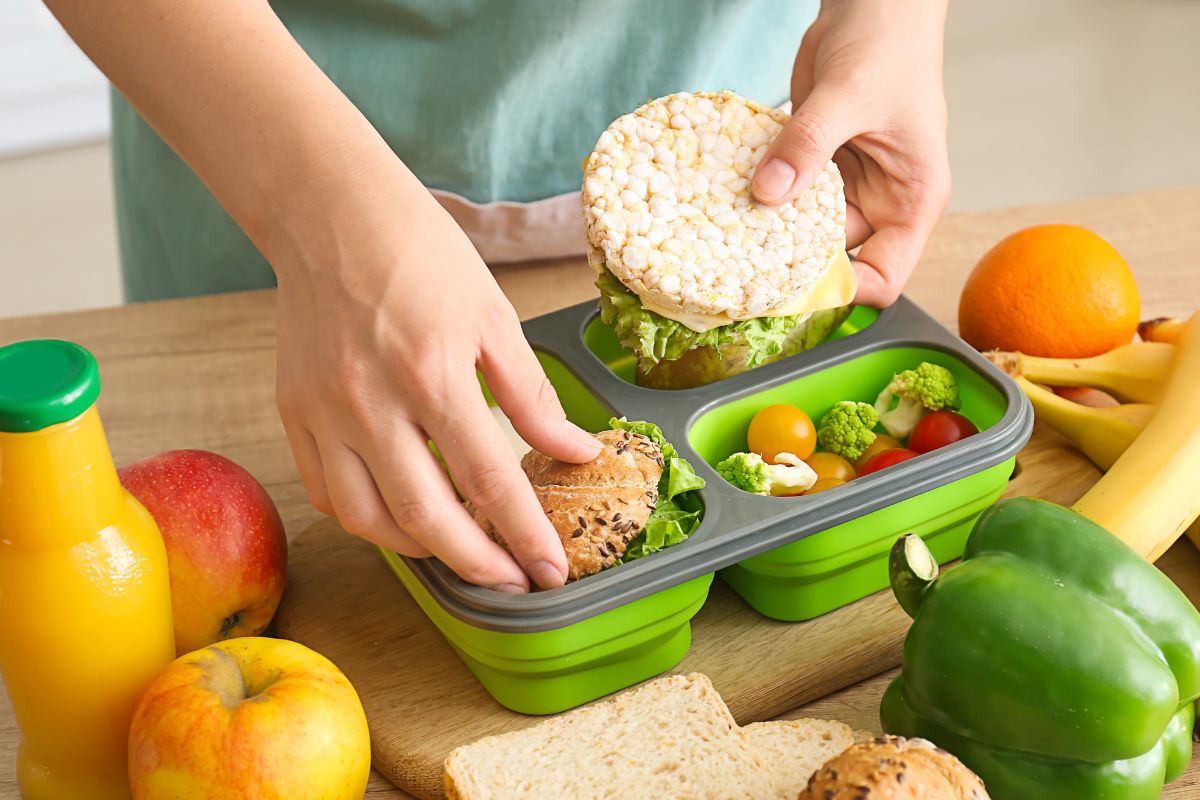 A picture of someone packing healthy snacks. 