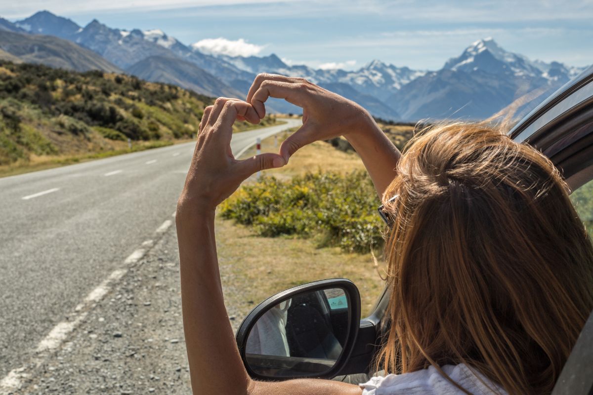 A picture of someone doing a heart sign.
