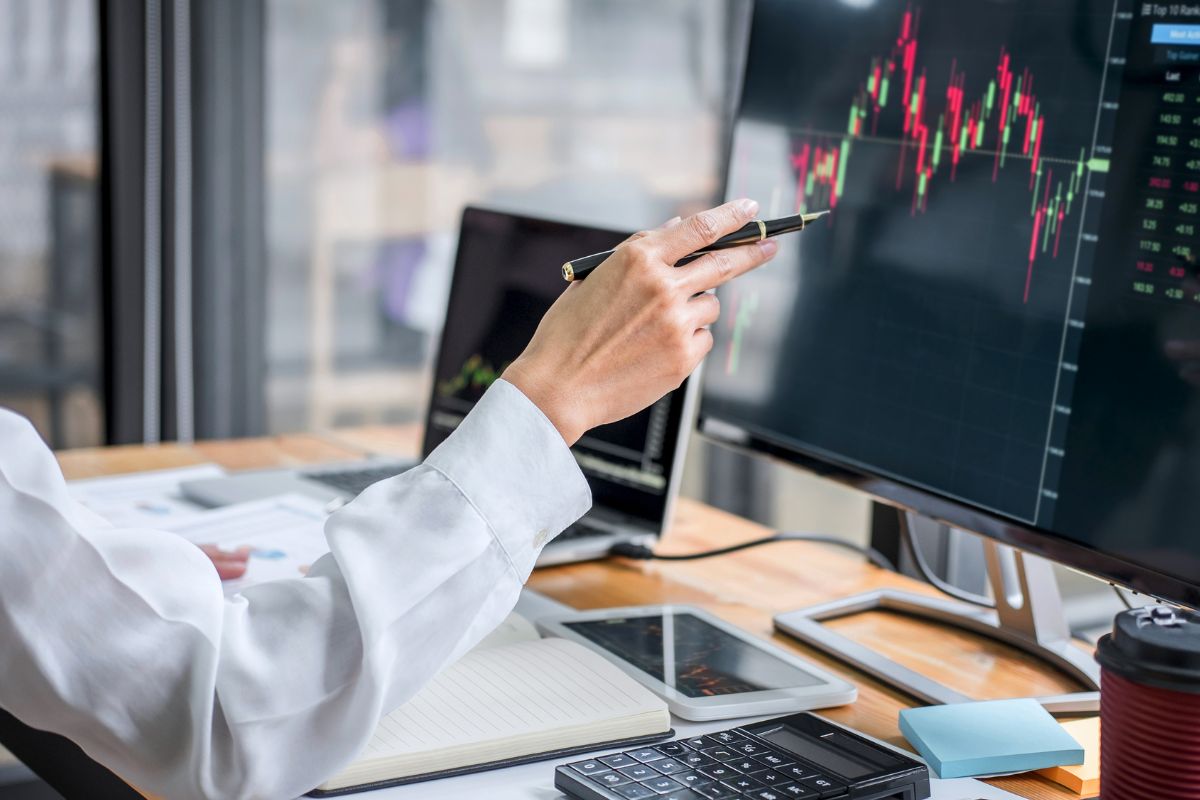 A picture of someone doing stock analysis.