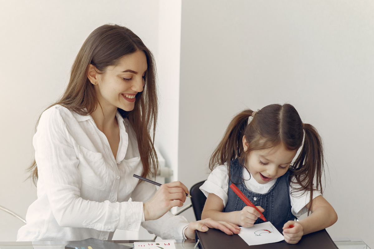 A picture of a child being tutored.