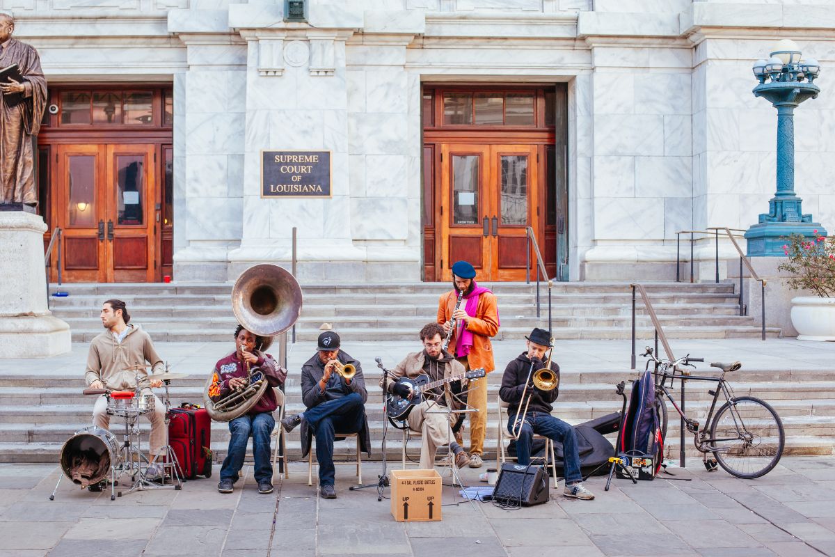 A picture of people street performing.