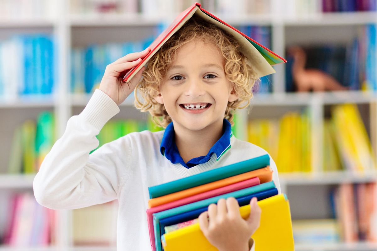 A picture of a child picking books to read.