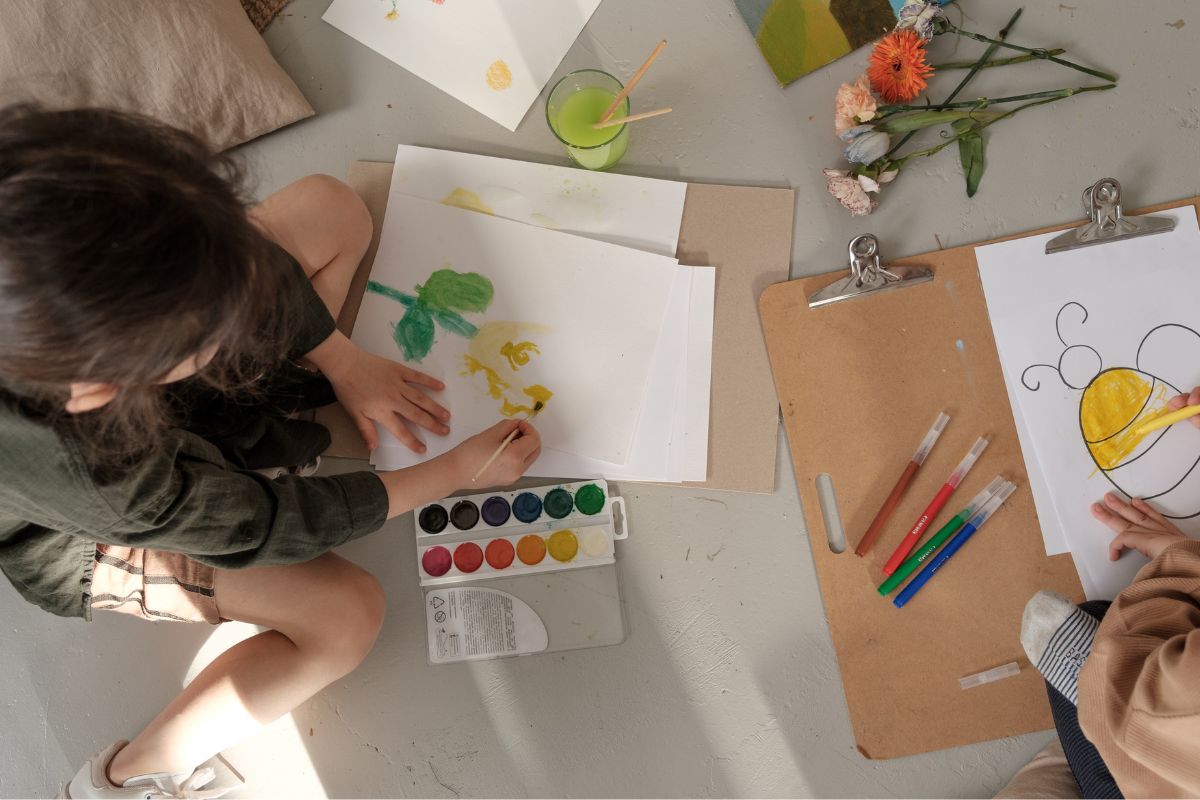 A picture of people painting. 