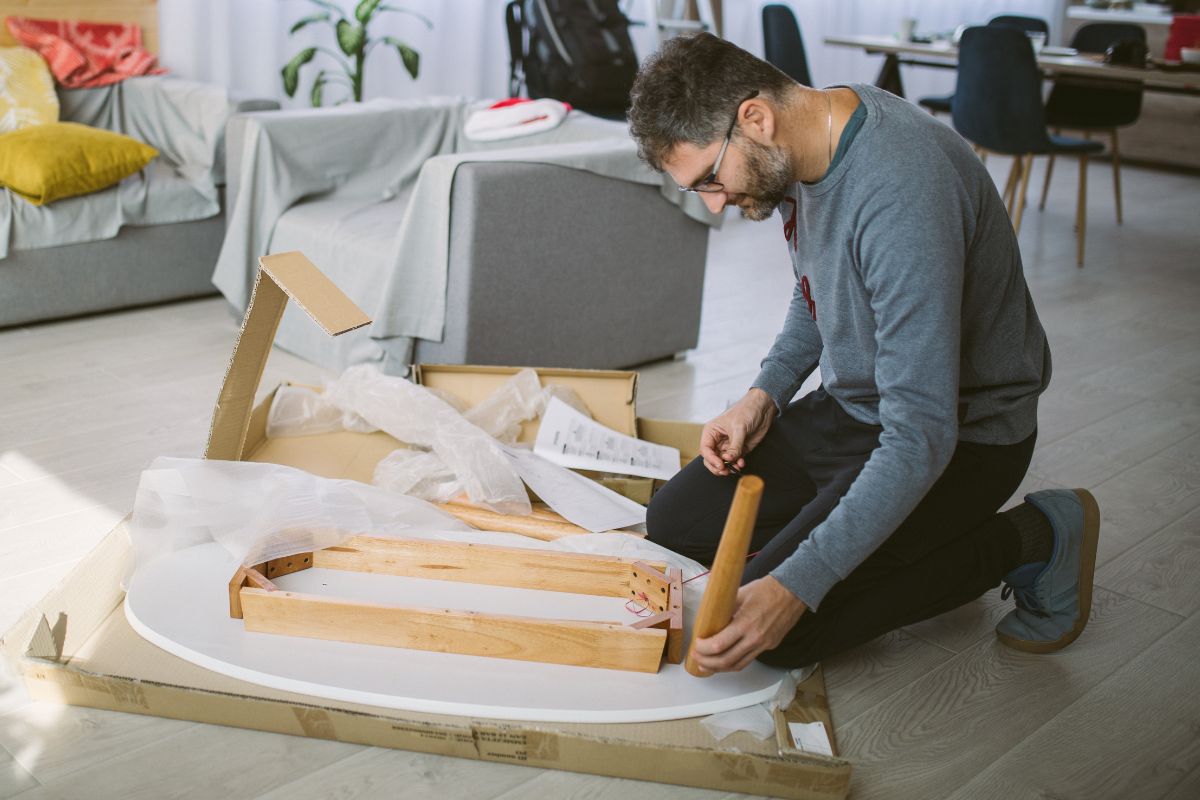 A picture of someone doing a furniture.