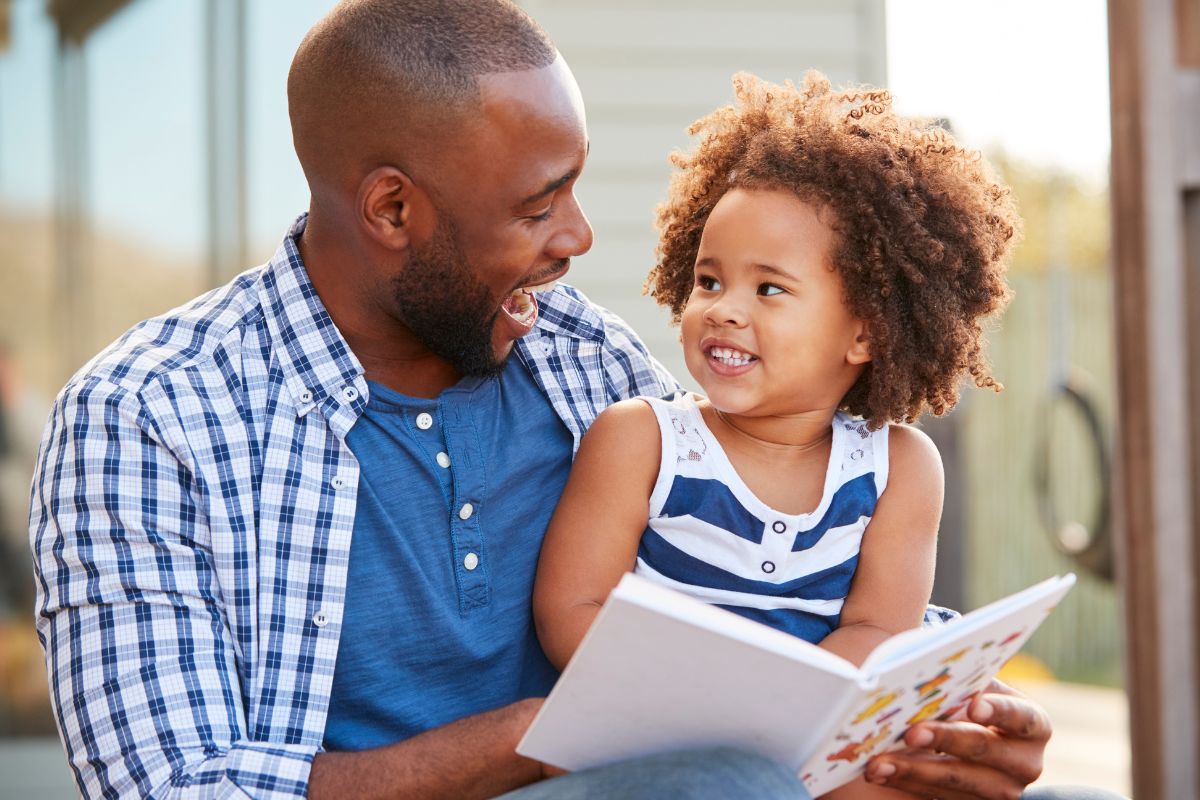Image of reading to a child. 