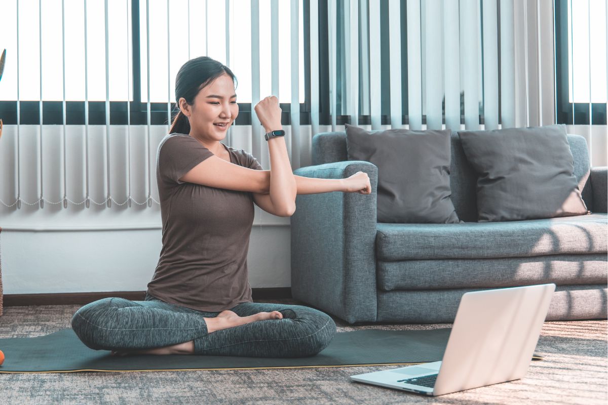 Image of someone doing yoga online. 