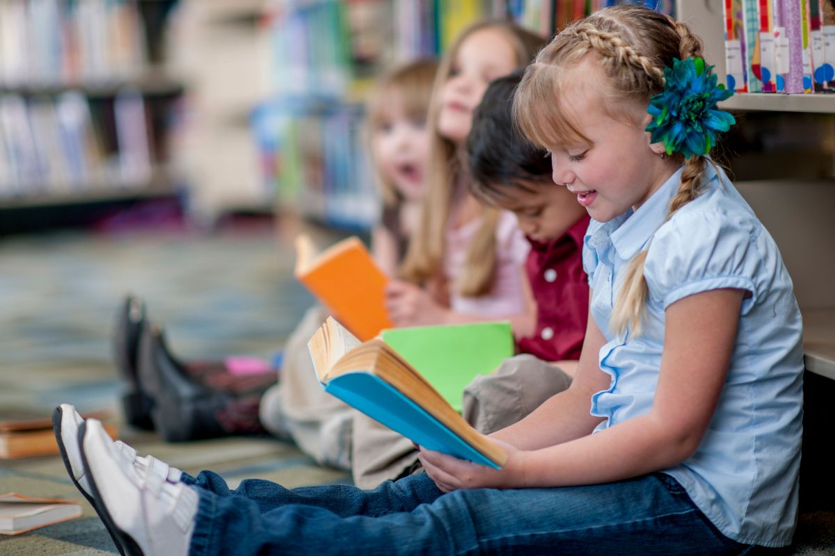 Picture of children reading books.