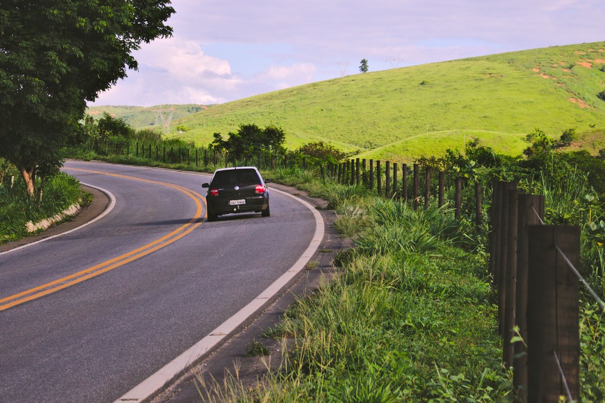 Picture of a car on a rural road. 