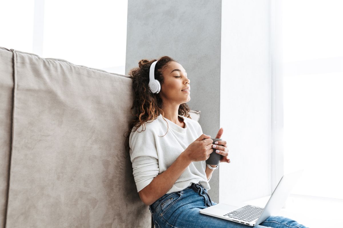 A picture of someone housesitting while listening to music. 