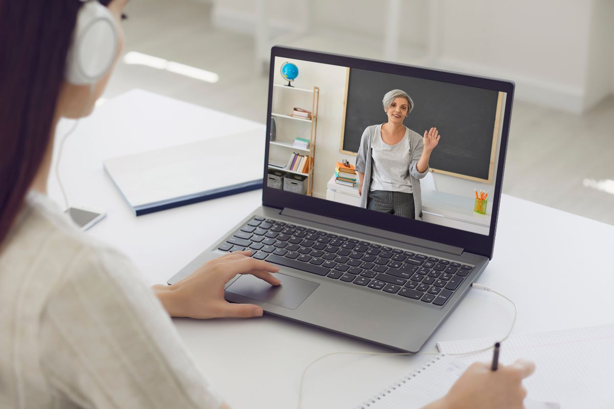 A picture of someone taking an online course. 