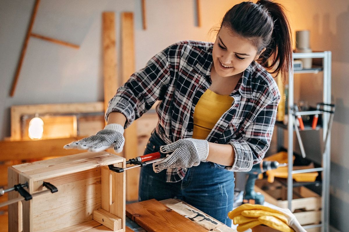 A picture of someone making furniture. 