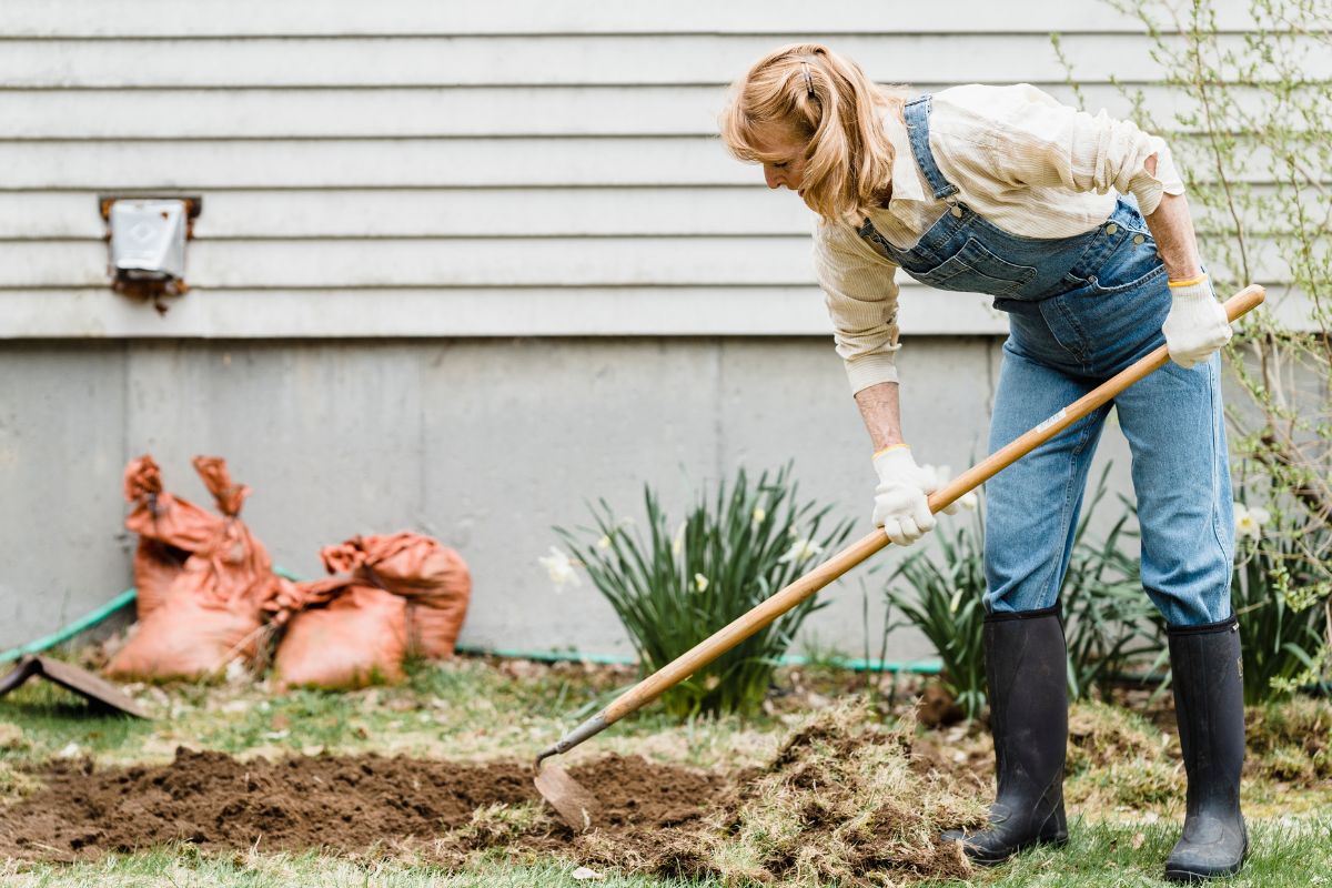 A picture of someone doing yard work. 