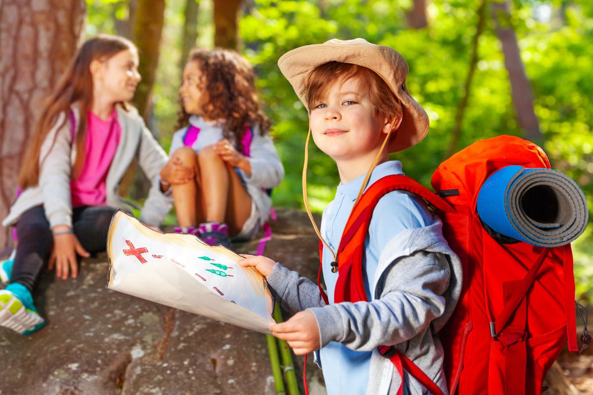 A picture of a kid doing scavenger hunt. 