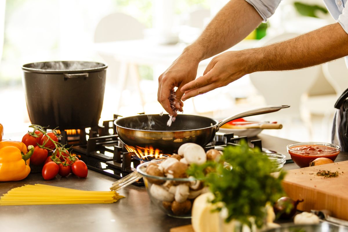 A picture of someone cooking. 