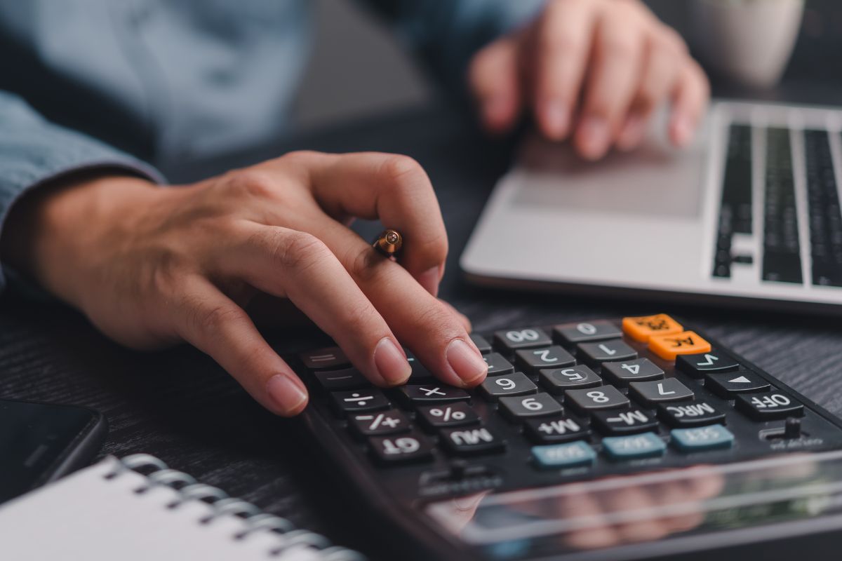 A picture of someone calculating,