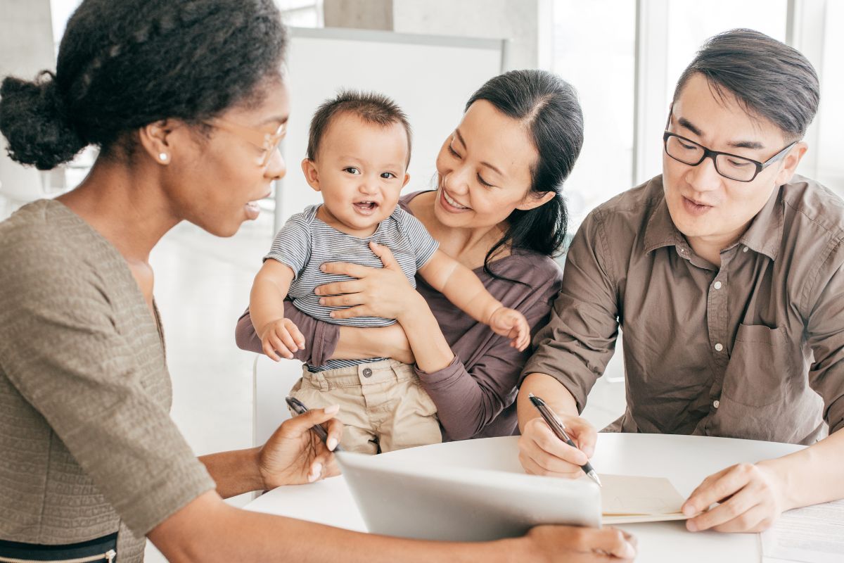 A picture of a family setting up emergency funds. 