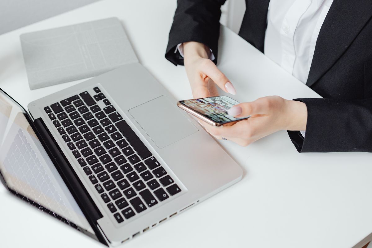 A picture of someone using their gadgets. 