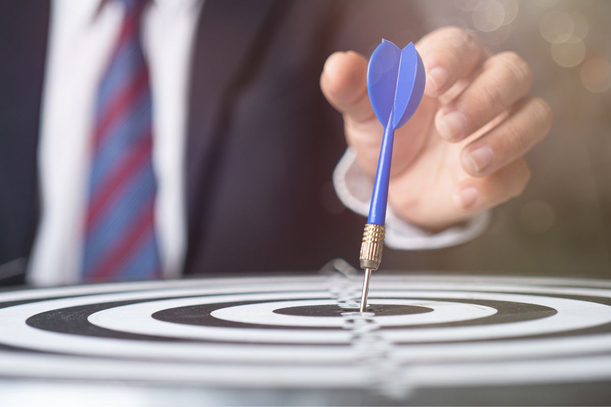 A picture of someone hitting the bullseye.