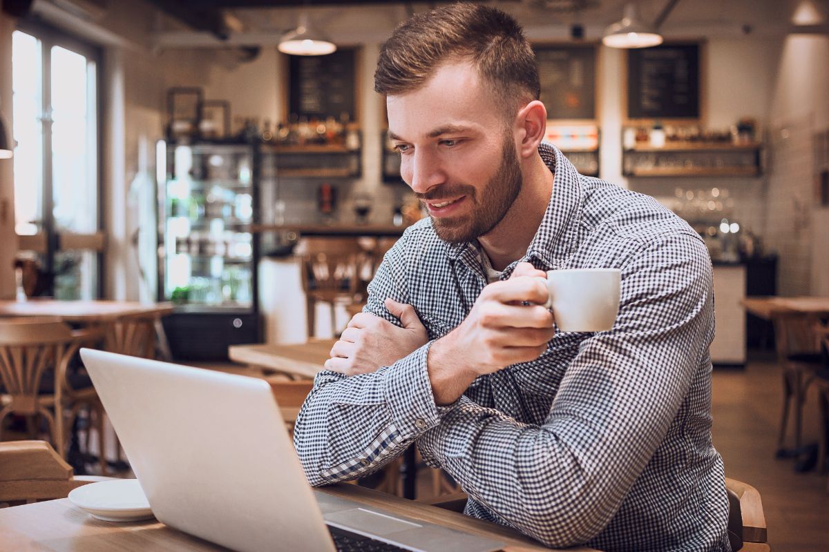 A picture of someone reading something online. 