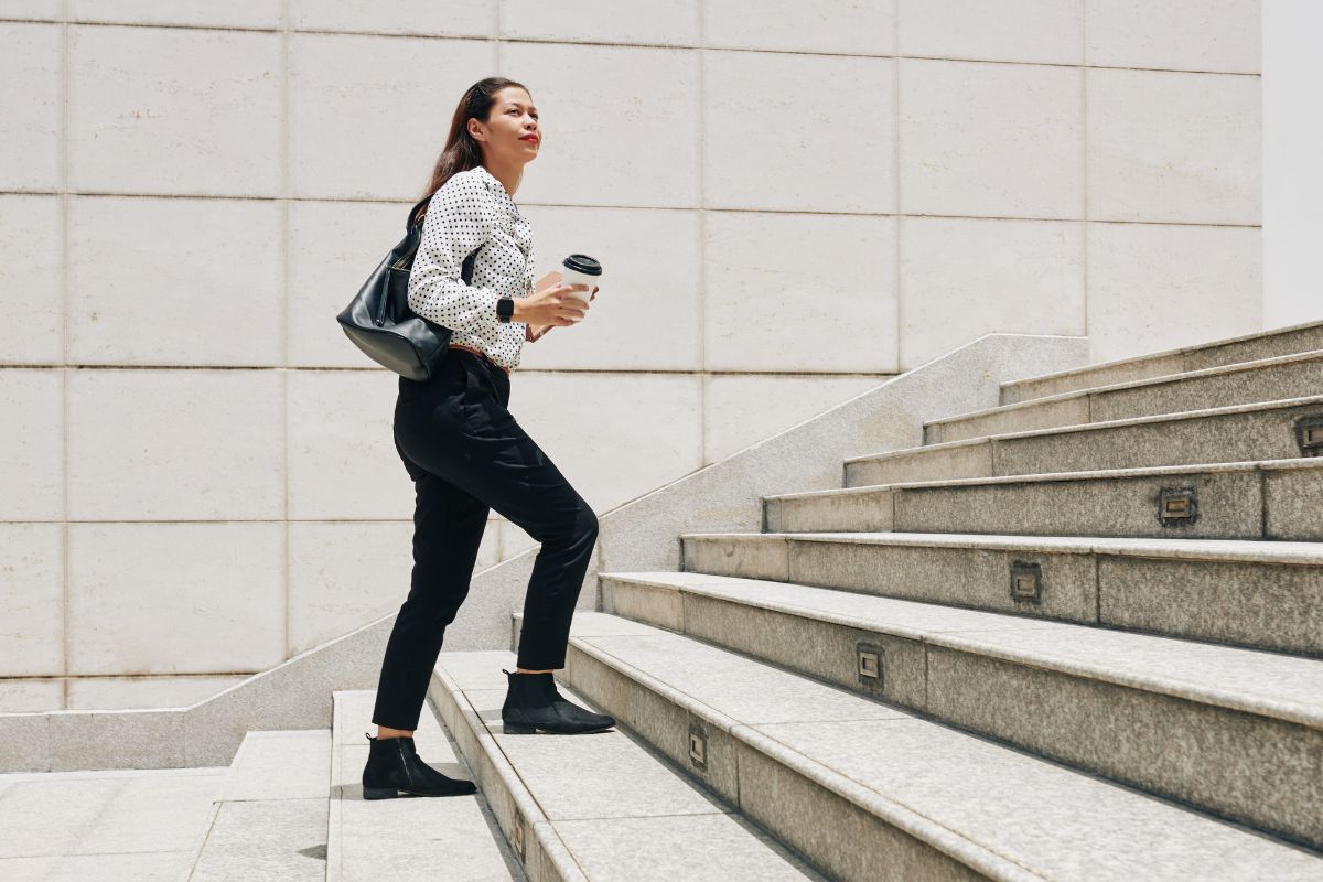 A picture of someone climbing up the stairs. 