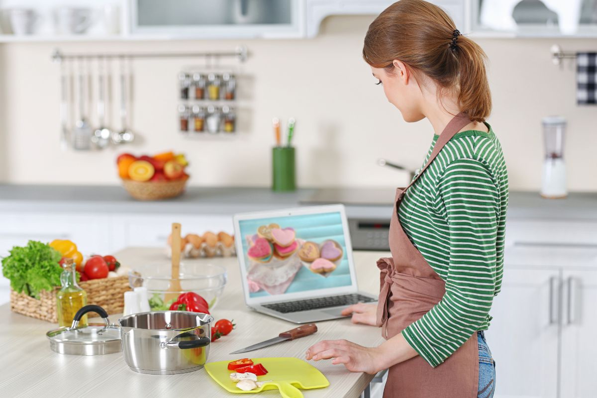 A picture of someone watching video recipes. 
