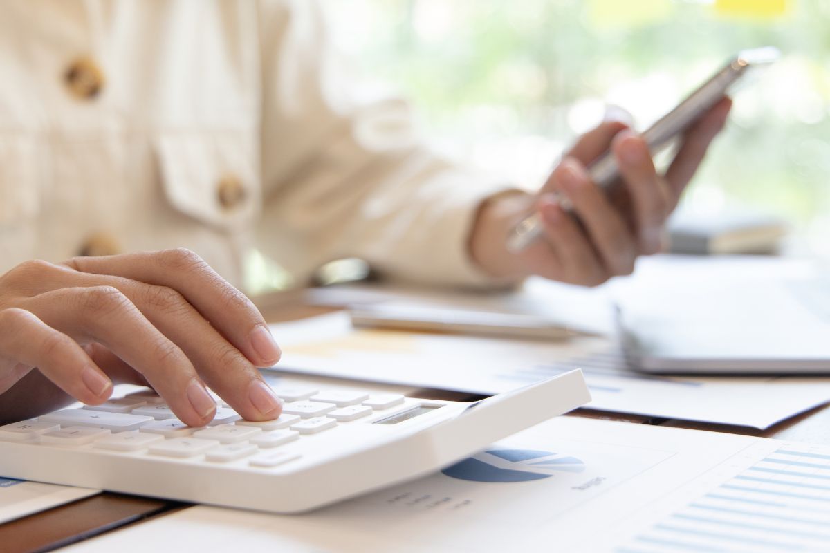 A picture of someone calculating. 