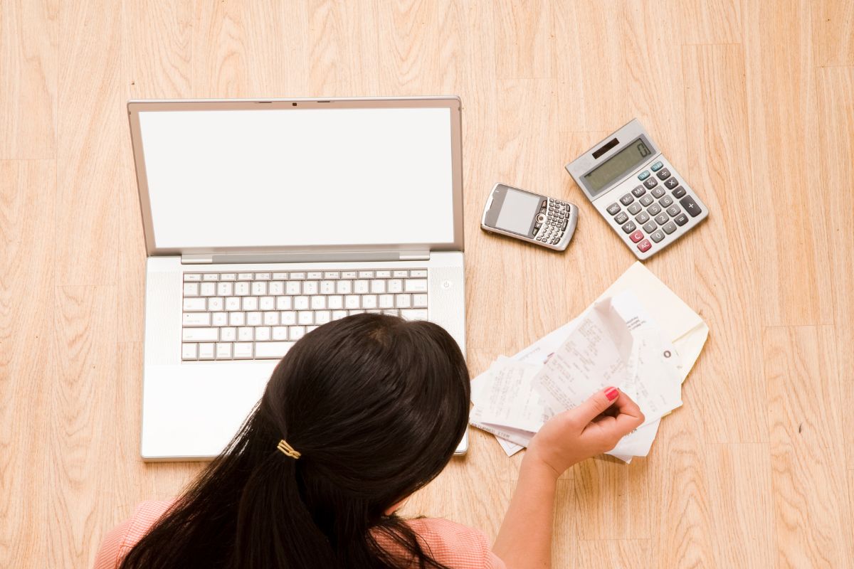 A picture of someone looking at their expenses. 