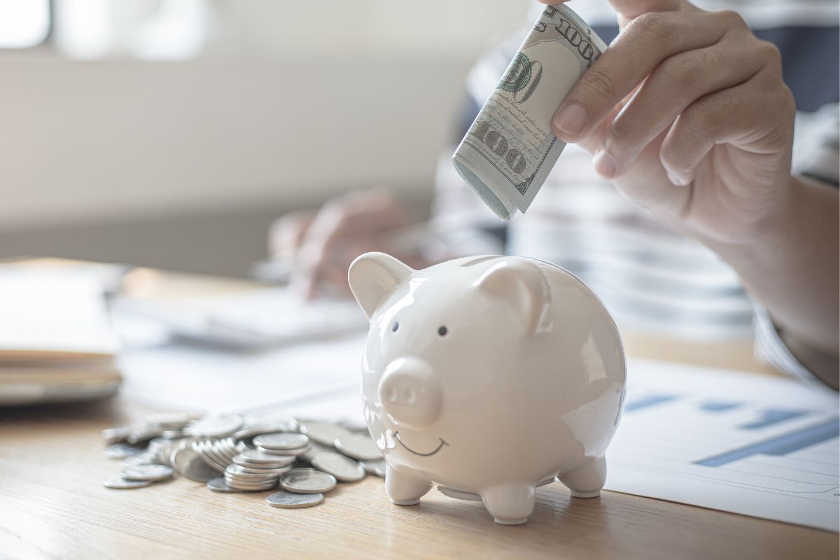 A picture of someone saving money. 