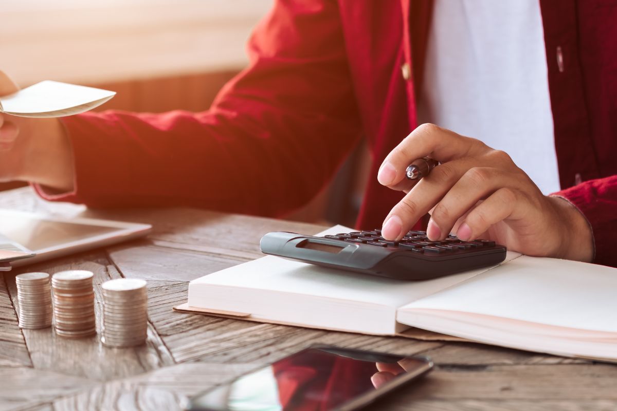 A picture of someone calculating. 