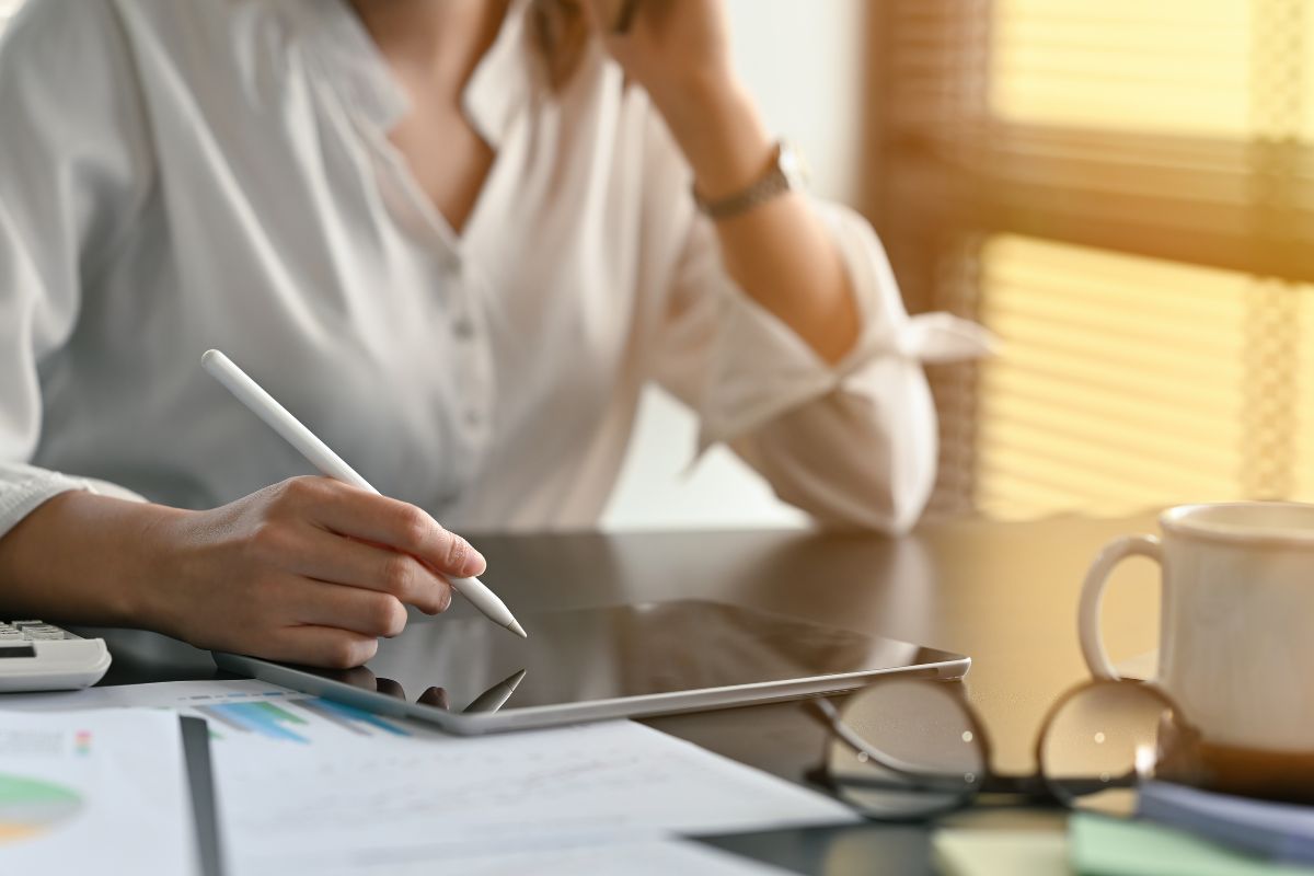 A picture of someone analyzing their finances. 