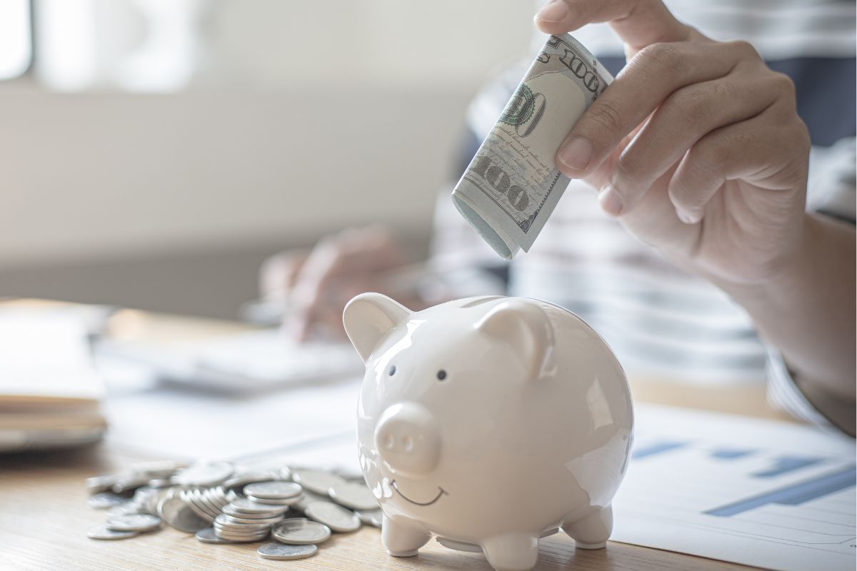 A picture of someone saving money. 