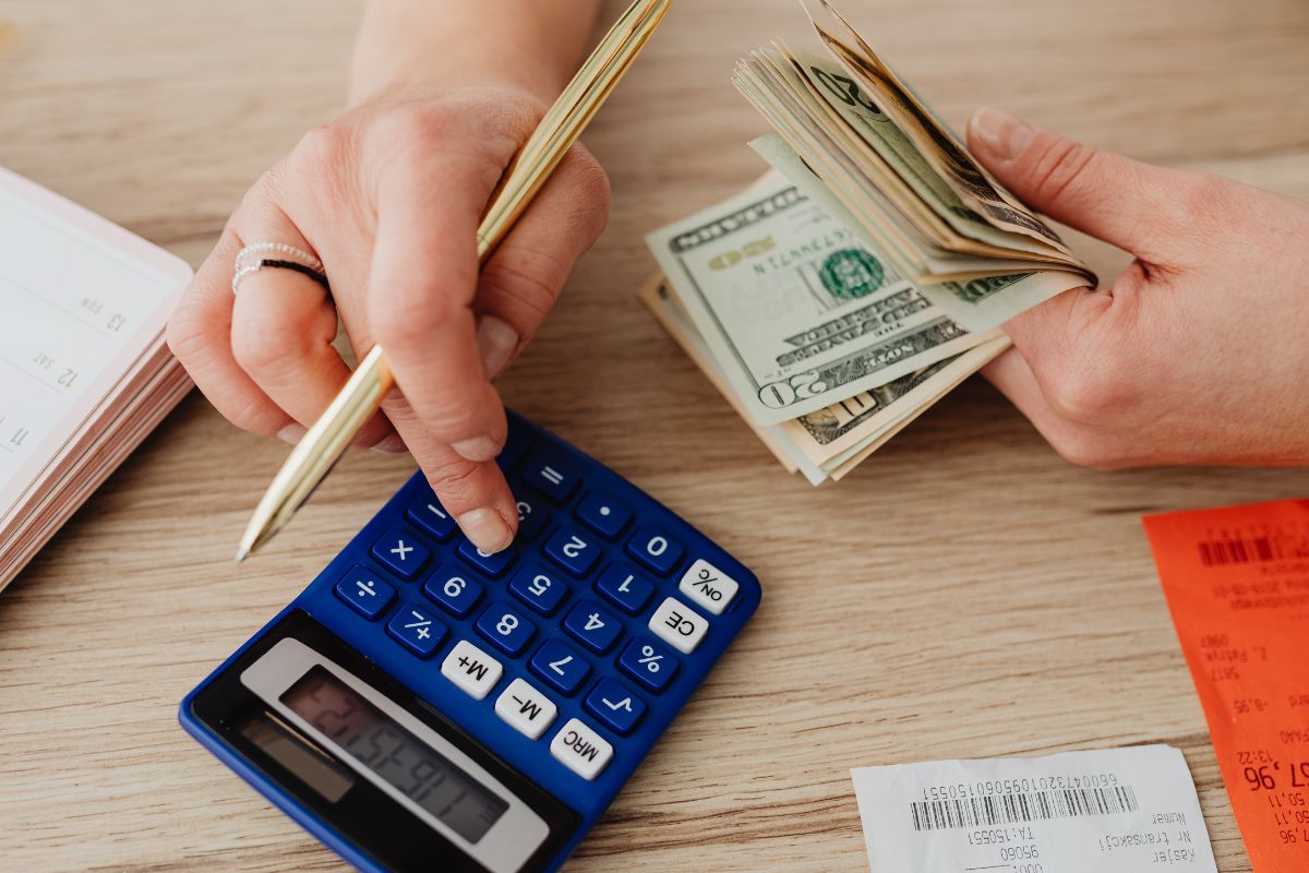 A picture of someone calculating their budget. 