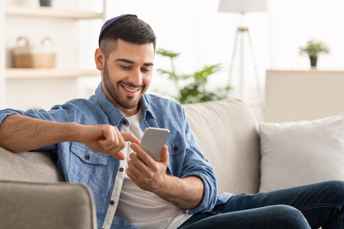 A picture of someone surfing on the internet happily. 