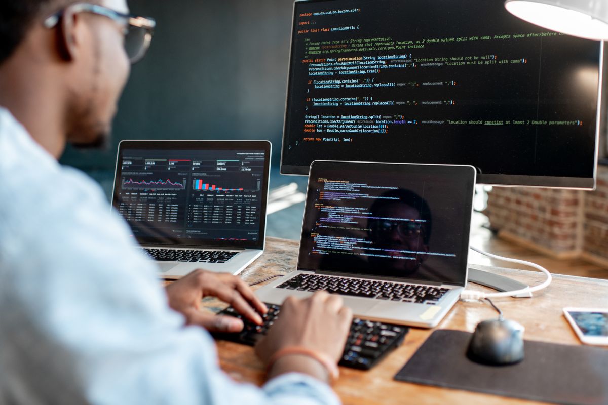 A picture of someone coding. 