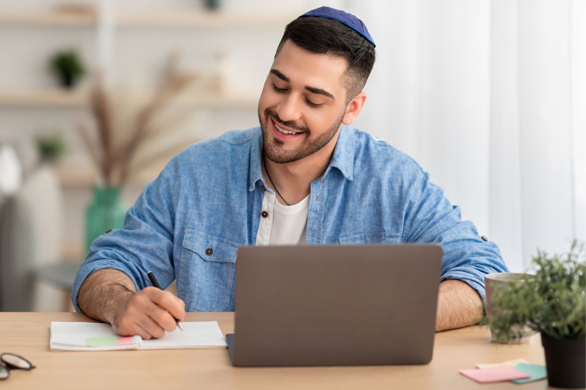 A picture of someone writing something. 