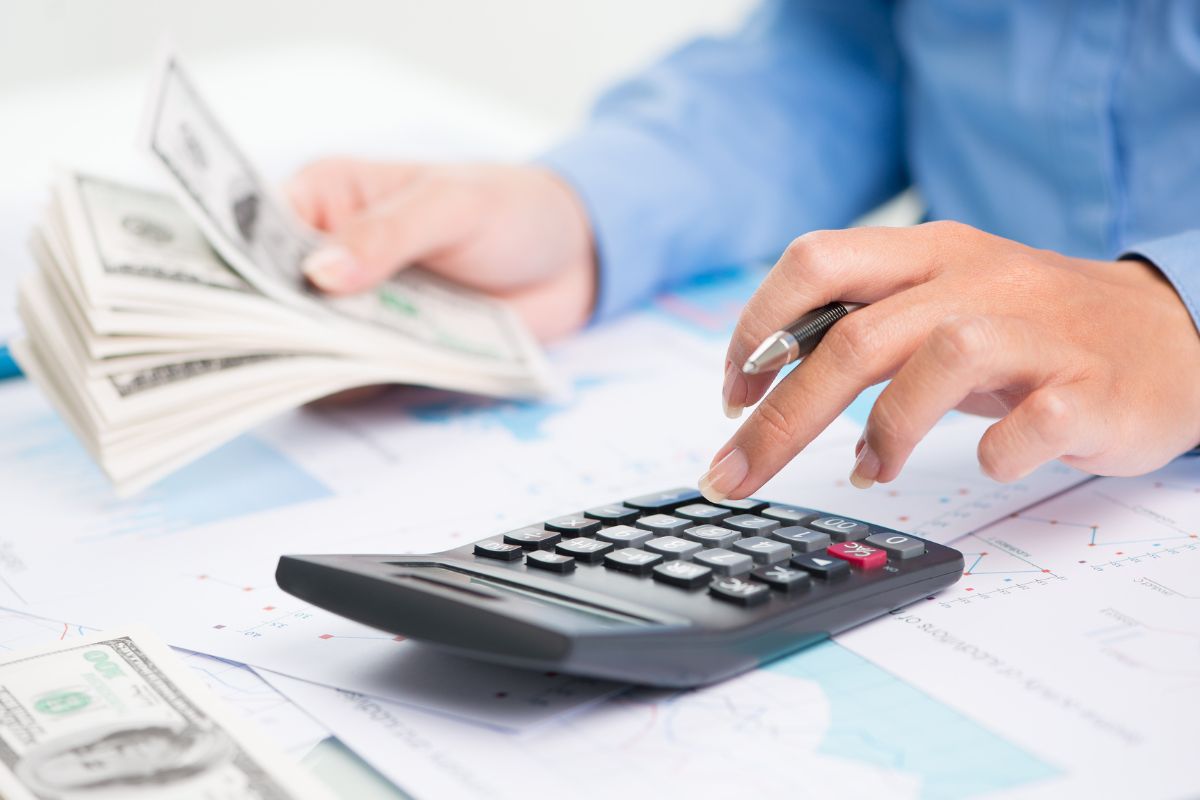 A picture of someone calculating something. 