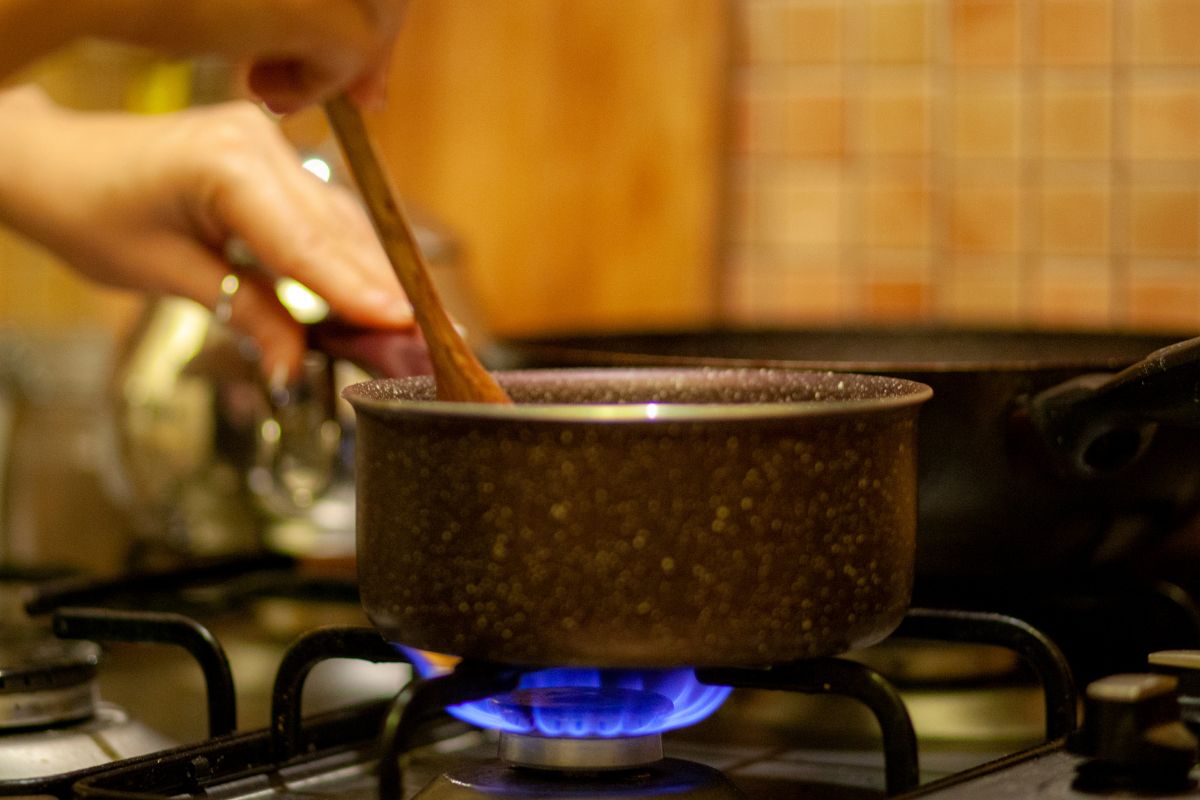 A picture of someone cooking. 