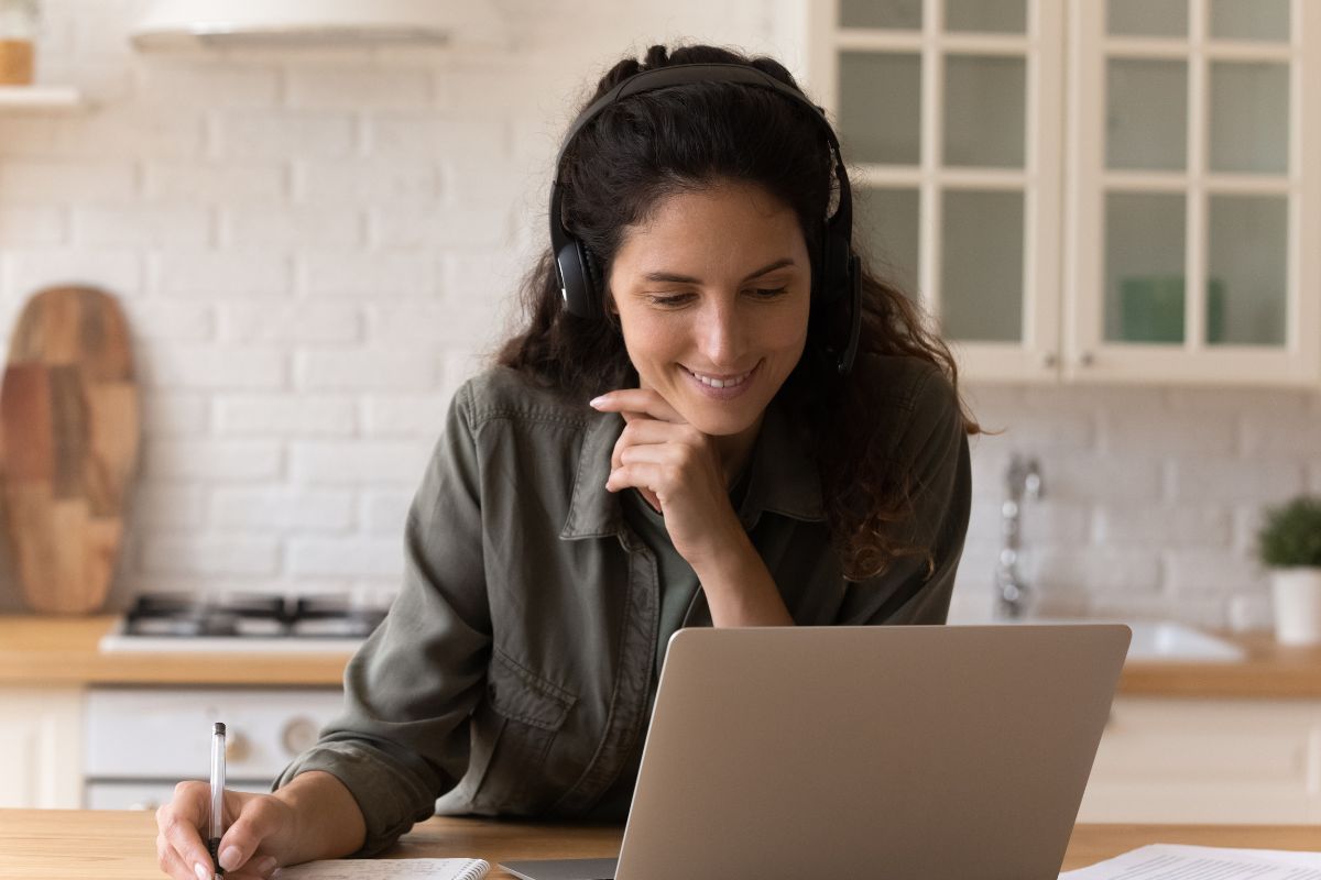 A picture of someone taking notes. 