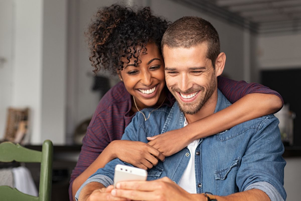 A picture of a couple smiling. 