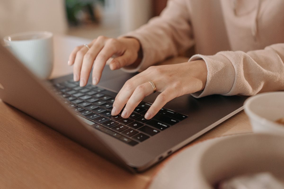 A picture of someone typing.