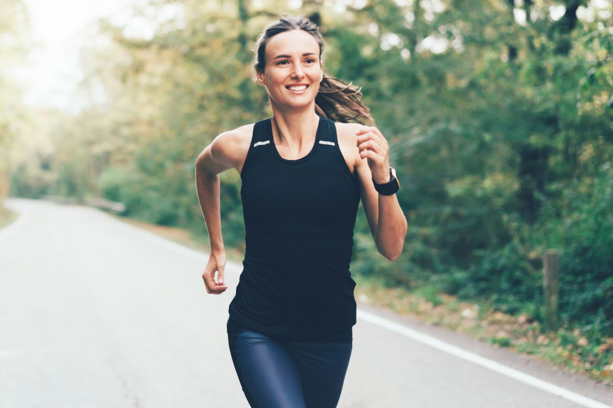 A picture of someone happily jogging. 