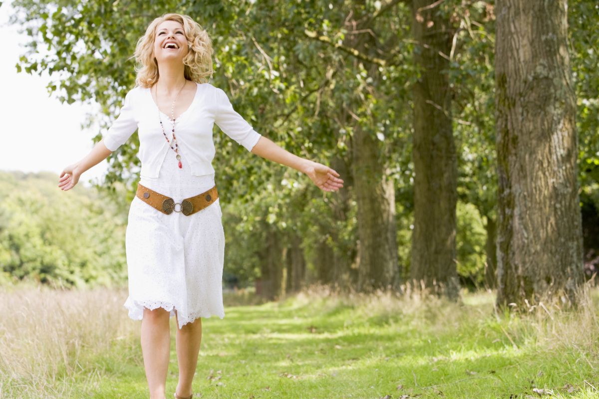 A picture of someone walking happily. 