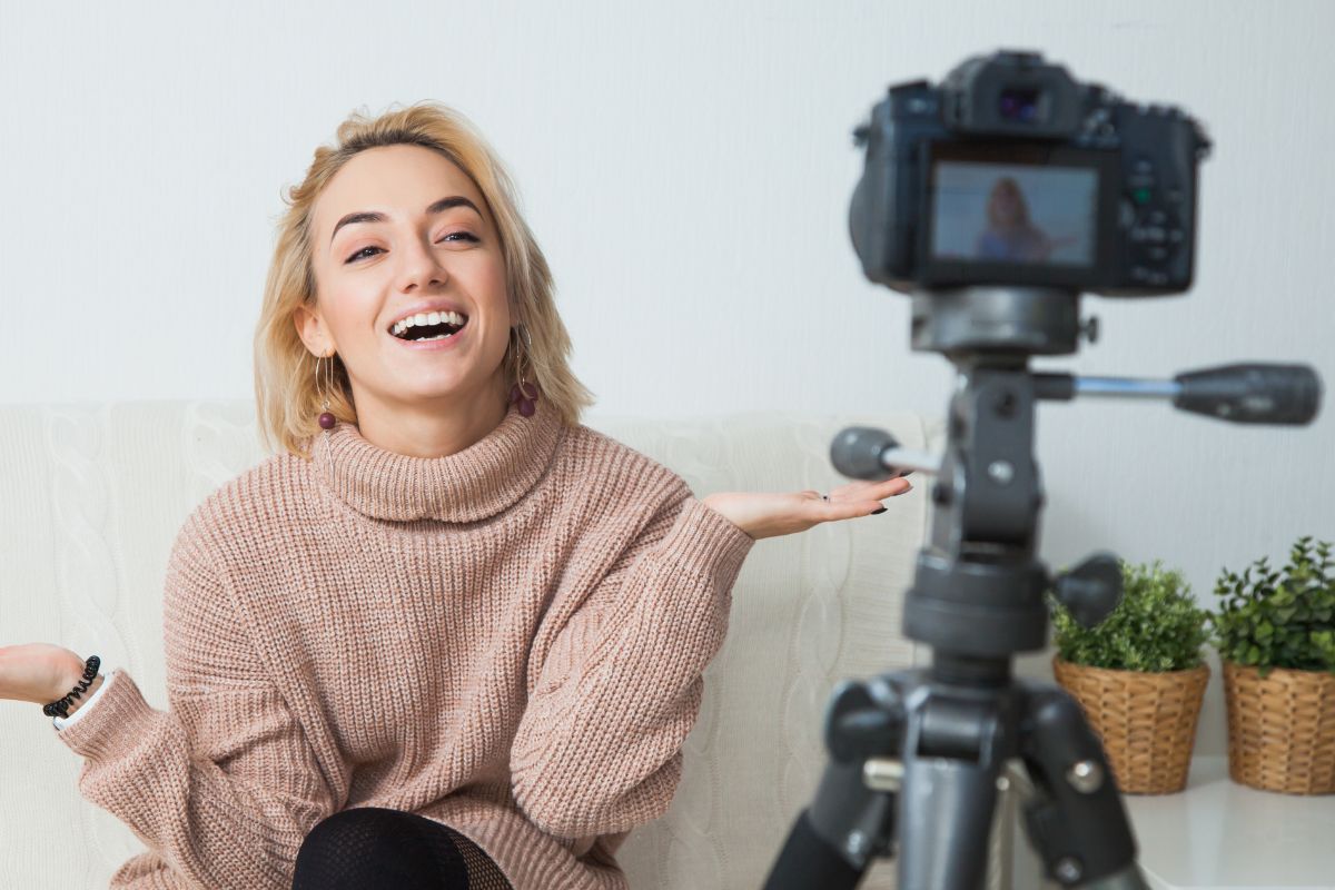 A picture of someone filming themself. 
