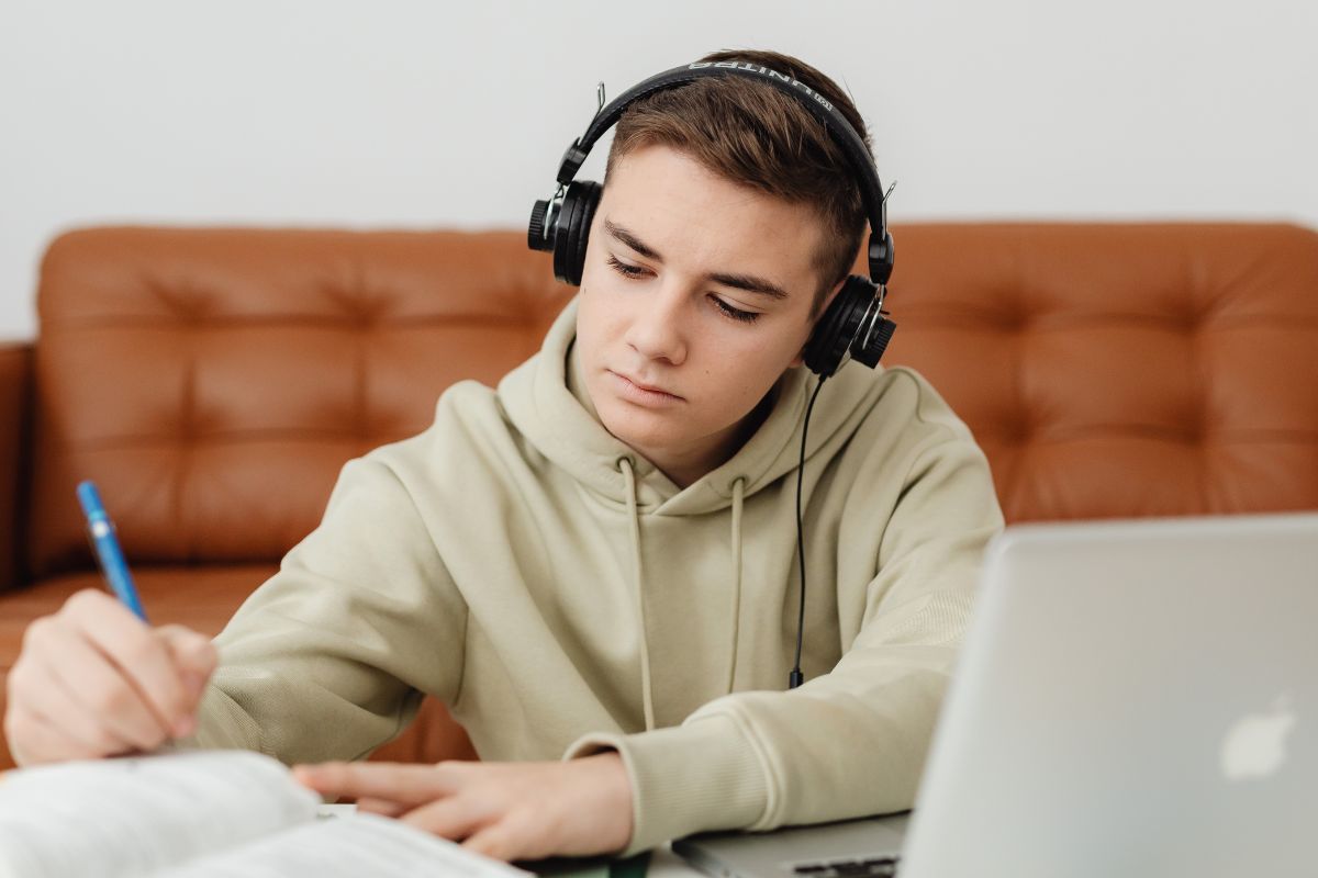 A picture of someone listening to music. 