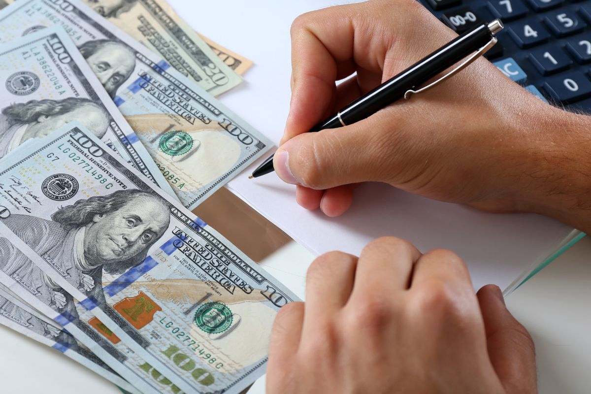 A picture of someone writing something. 