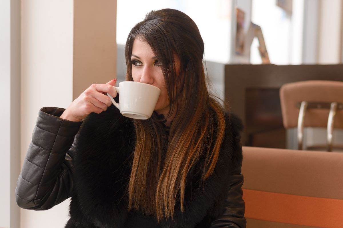 A picture of someone drinking coffee.
