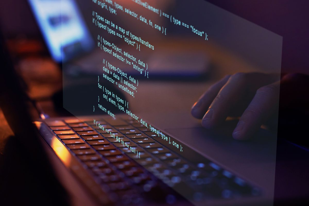 A picture of someone coding. 