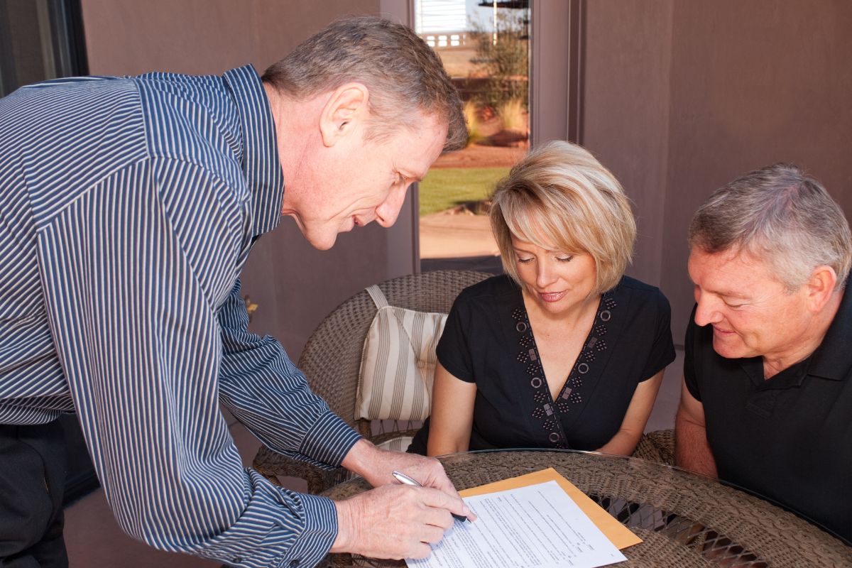 A picture of people talking about wills.