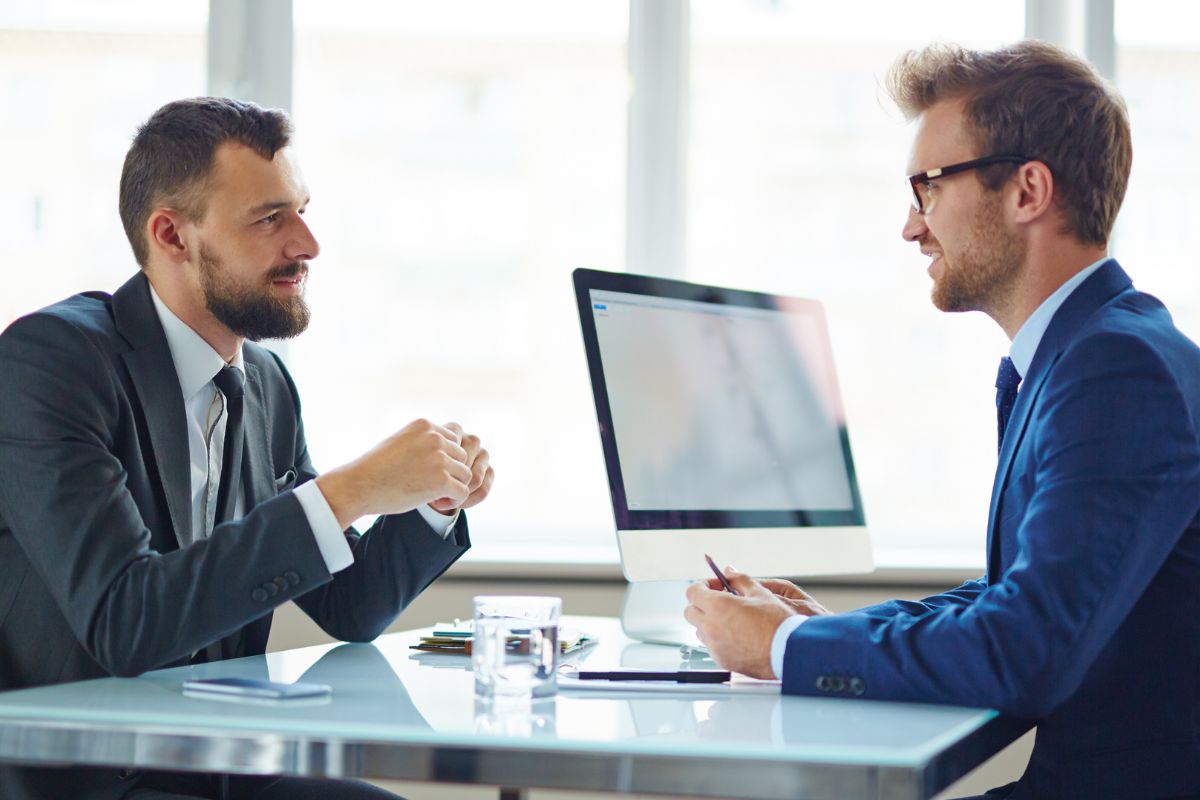 A picture of businessmen talking. 